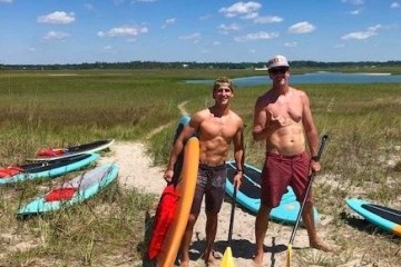 paddleboading through salt marshes