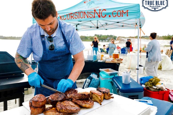 chef slicing steaks